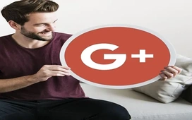 Man holding a Google-themed icon while sitting on a couch, symbolizing learning and mastering beginner-friendly cloud-based coding using Google Colab.