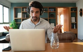 Job seeker in headphones on laptop video call – remote interview success tips and preparation guide online