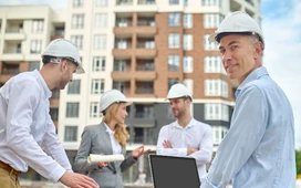 Project manager analysing construction performance data for building construction project management course training
