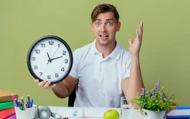 Pomodoro timer on a workspace desk illustrating effective time management and productivity techniques for focused study