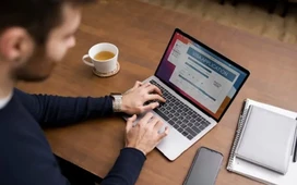 Person completing an online application on laptop – guide to finding remote data entry employment opportunities.