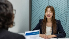 Professional job seeker optimising a resume with key skills to write in resume and effective career development strategies