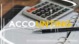 Calculator, notebook, and pen on financial documents with the word accounting displayed, representing advanced accounting and finance Level 5 studies.