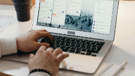 Professionals exploring AI project management tools on-screen to streamline planning, tracking and team collaboration online.