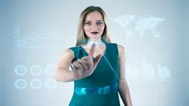 A woman interacting with a futuristic digital interface, symbolizing AI-powered goal setting, planning, and performance tracking tools.