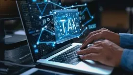 Person using AI-powered tax software on a laptop, representing digital automation in AI tax preparation training.