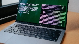 Laptop displaying ChatGPT interface on screen, illustrating beginner AI learning and ChatGPT training concepts