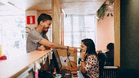 Customer service professional building positive client relationships, demonstrating customer relationship management skills