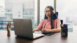 Remote customer service agent on laptop at home office – customer services work from home free course by OHSC