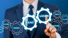 Business professional interacting with virtual gears labeled lead and learn, symbolizing advanced bookkeeping and double entry accounting skills
