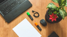 Administrative assistant developing office skills and a workplace skills plan to improve productivity and professional performance