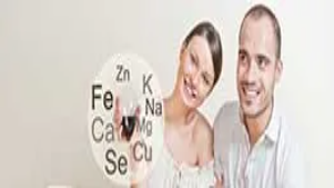 Smiling couple holding fresh food with nutritional elements highlighted, representing safe and hygienic food handling practices taught in Level 5 courses.