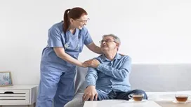 Care workers assisting patients and colleagues, highlighting practical training in Health & Social Care Level 3 online – OHSC