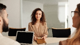 Job candidate participating in a professional interview and learning how to answer interview questions effectively