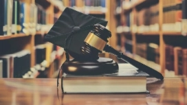 Students analysing legal documents in a classroom setting – study law online with OHSC’s Level 4 Diploma in Law (QRF)