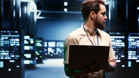 Students configuring network devices and servers in a modern IT lab – Level 4 IT Diploma in Networking online at OHSC