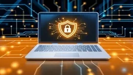 Laptop with a glowing security shield icon on a digital circuit background, representing key concepts in network security and data protection