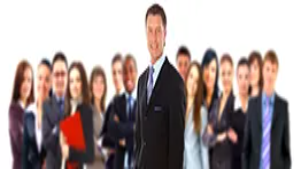 A confident professional standing before a group of colleagues, symbolising communication, influence, and NLP principles taught in Level 2 NLP courses.