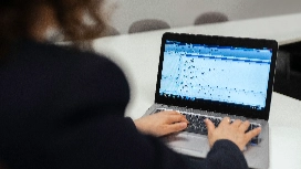 Office professional using modern software and digital applied skills to improve productivity and technology knowledge in the workplace