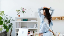 Professional reviewing schedule and tasks at desk – learn work life balance at work and boost productivity online