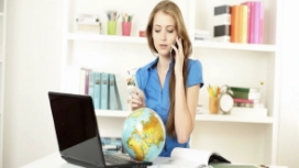 Professional working remotely with a laptop, illustrating professionalism, workplace behaviour and professional conduct skills