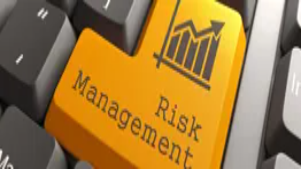 Risk management concept with upward graph icon on keyboard key, representing online diploma in risk management training.