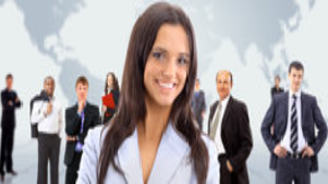 Confident team leader standing before a group of professionals, representing leadership skills taught in team leading Level 3 training.