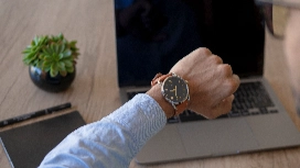 Office professional organising tasks and schedules while applying time management techniques to improve workplace productivity