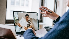 Candidate participating in a virtual interview and learning how to prepare for a professional interview online