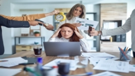 Professionals collaborating in a workplace, illustrating teamwork, communication and effective workplace collaboration skills