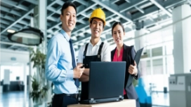 Professionals collaborating in a workplace, illustrating conflict management, teamwork and effective communication skills