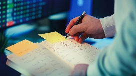 Office professional using digital tools to improve workplace productivity, organisation, and daily task management efficiency